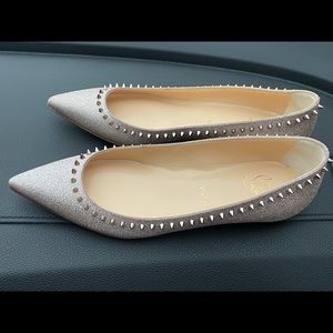 Brand new never worn silver flats.